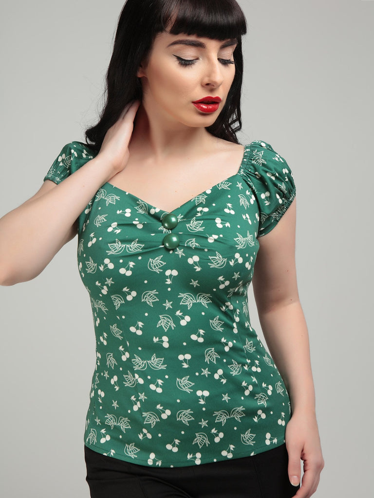 Collectif Mainlaine Dolores 50s Style Green Top with a Cherry and Swallow Print - Curvique Vintage