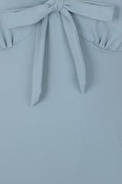 Mint Vintage Inspired Deep Neckline Top with Bow Detail - Curvique Vintage